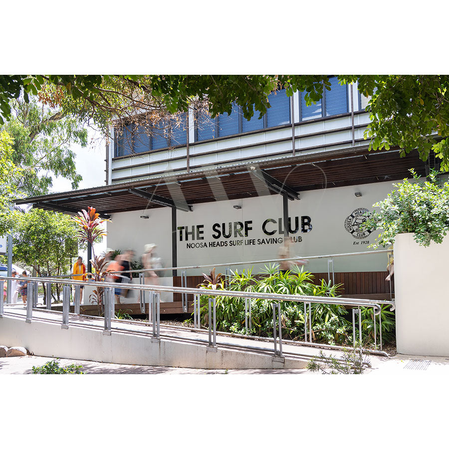 The AWP Image Librarys product, Noosa Surf Club Image 5583, captures the clubs logo on its wall. Lush greenery and dynamic foot traffic complement its modern concrete and metal design. Near Hastings Street, it embodies the vibrancy of Noosas lively atmosphere.